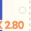 877[13]: Blå farveprik til højre over 2.8[0].
Nummer 13 i arket i en del af udgivelsen.
I samme ark optræder: 877[3]: Variant.