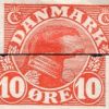 2[B,70c]: Hvid plet i DAN[M]ARK og brud på linie i ovalen foran kraven.
Nummer 70 i B-arket i en del af udgivelsen.